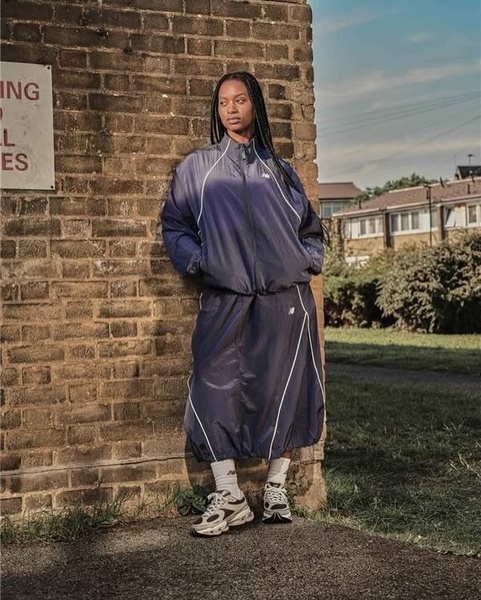 windbreaker jacket, track jacket, nylon skirt, tracksuit, casual sportswear, sporty skirt, brand awareness, lifestyle, outdoor, calm, trustworthy, neutral, blue